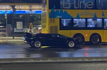 [Lamborghini Countach] not sure if legit! in sydney, in the rain, across the road from KFC lol