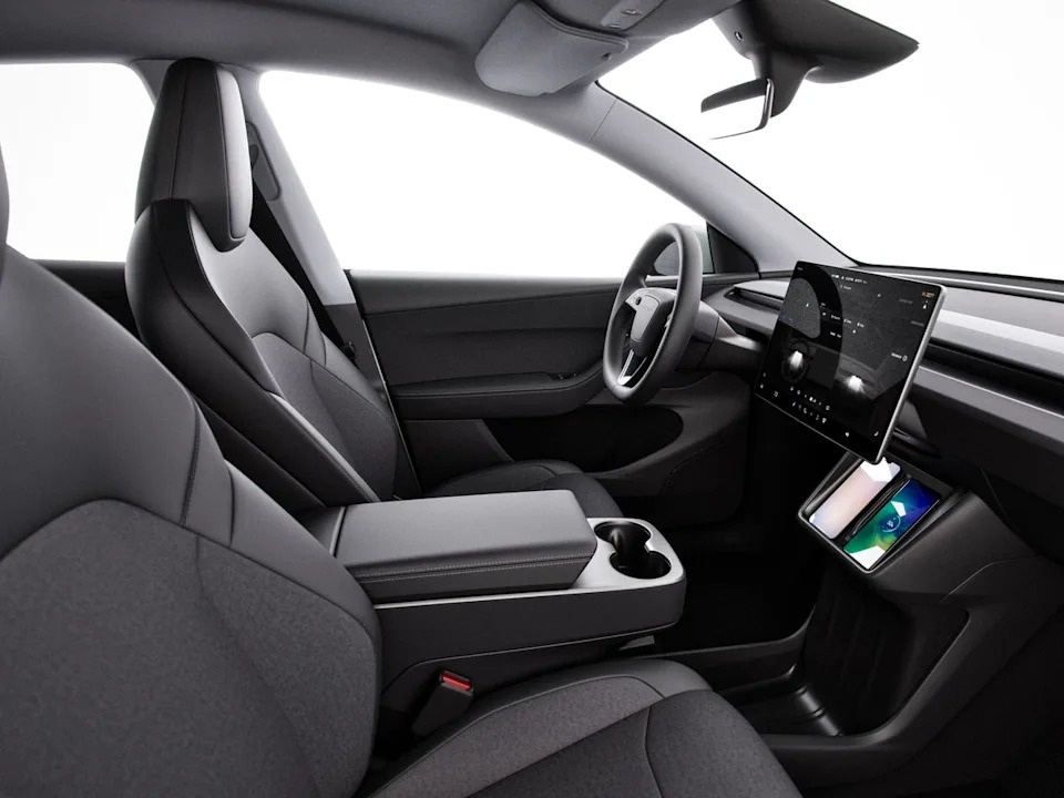 The interior of the new Tesla Model Y Standard features cloth seats and less spec (Tesla)