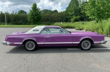 Purple 1977 Lincoln Mark V: the Official Car of owning a pizzeria with an animatronic animal band in the 1980s and murdering kids on the side out of an obsession with immortality