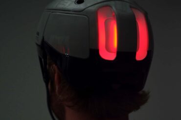 Rivian's e-Bike Offshoot Debuts a Smart Helmet With Headlights and Brake Lights