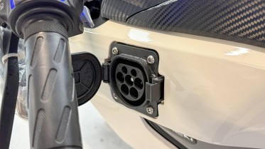 You charge the bike without removing the battery.