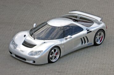 The Lotec Sirius is an one-off German hypercar from 2000, built by Kurt Lotterschmid, featuring a twin-turbo Mercedes-Benz V12 engine producing up to 1,200 horsepower, aiming to rival the McLaren F1 with a claimed 400 km/h (249 mph) top speed (0-100 km/h 0-62 mph) in ~3.8 seconds)