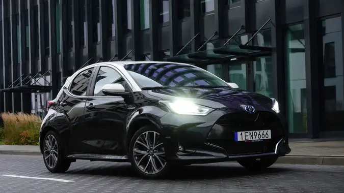 Berlin, Germany - 18th October, 2020: Toyota Yaris Hybrid stopped on a street.