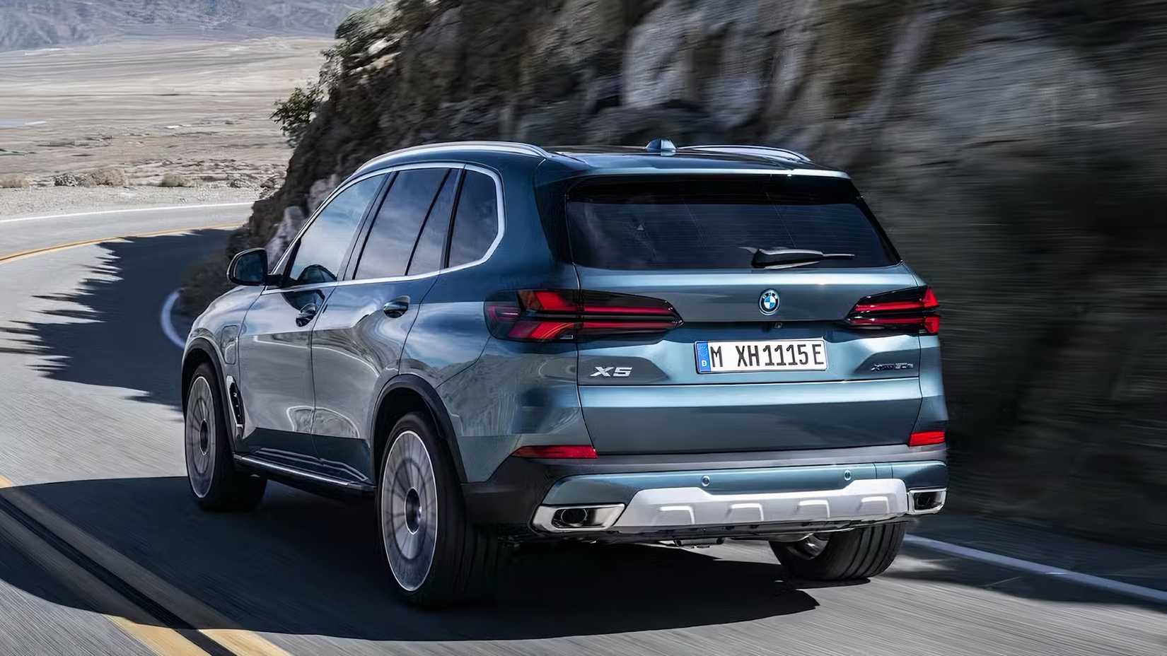 2025 BMW X5 in gray driving on road
