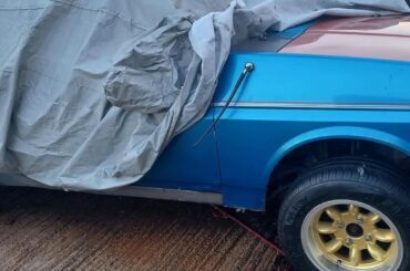 Can anyone tell me if this antenna on the front quarter panel is stock or modified