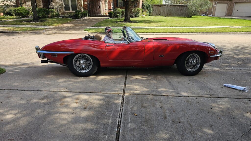 Dad thinking he's cool in his E-Type.