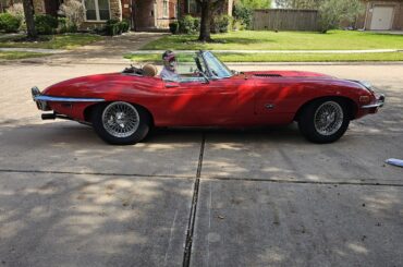 Dad thinking he's cool in his E-Type.