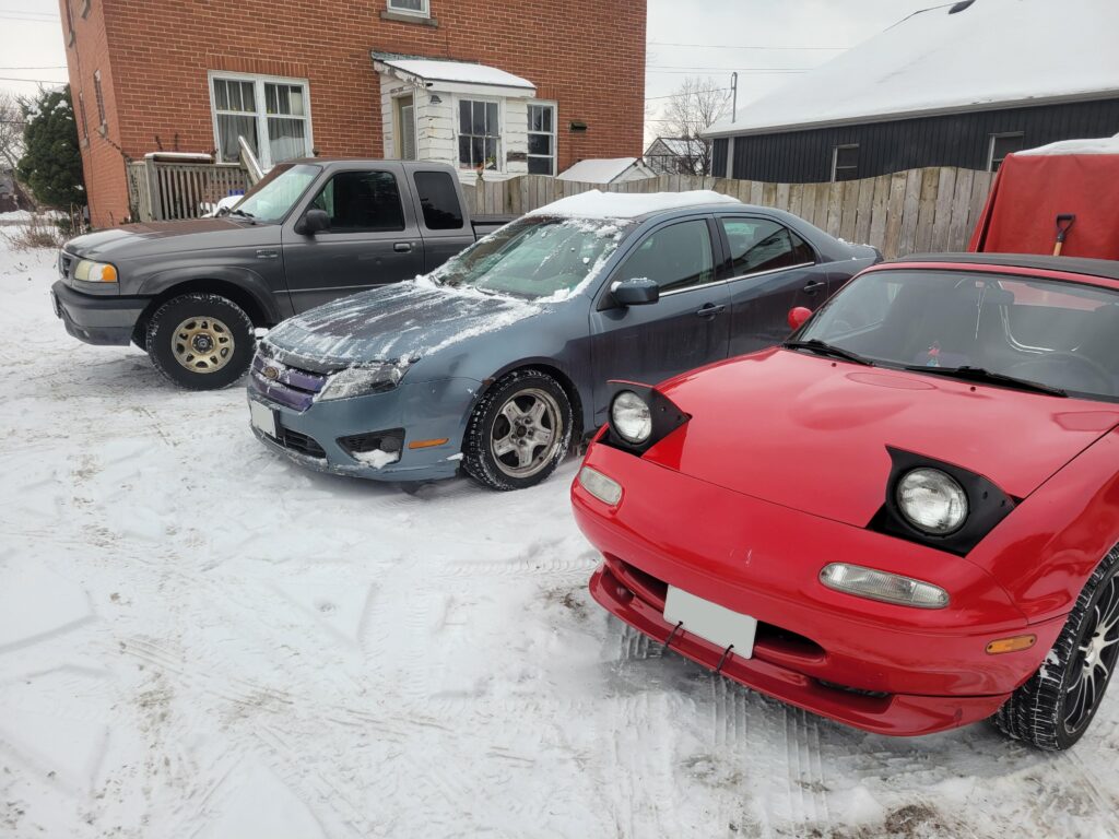 2 mazdas + 2 Fords = 3 vehicles