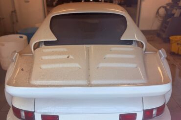 [1 of 15] Gemballa Avalanche Porsche covered in dust hiding in the back of a random dealership in Oregon.