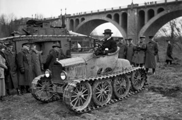 Secretary of War Newton Baker in a Ford Model T designed for cross-country reconnaissance, 1921.