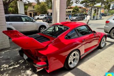[Porsche RUF RSR] in a gas station parking lot