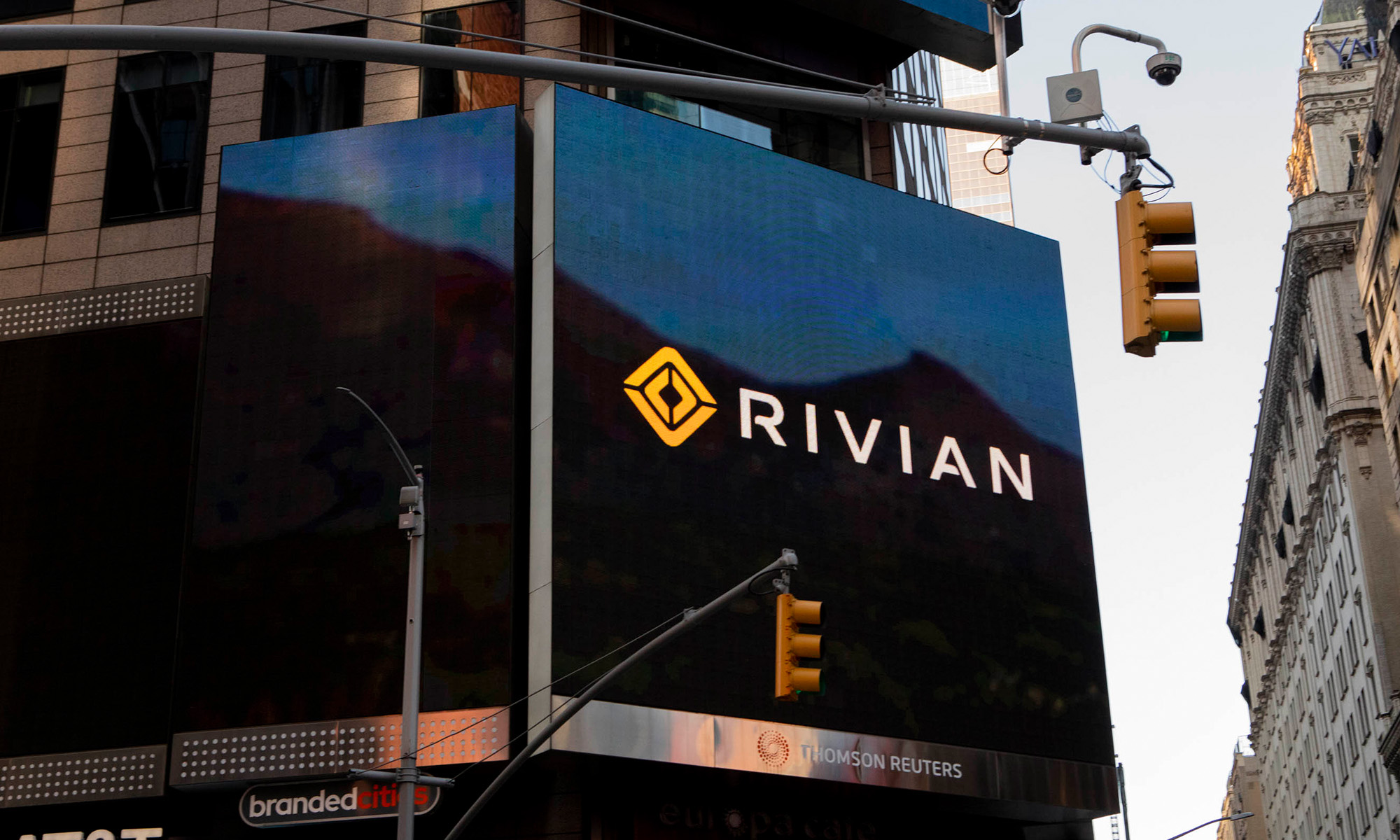 Rivian's logo on a billboard.