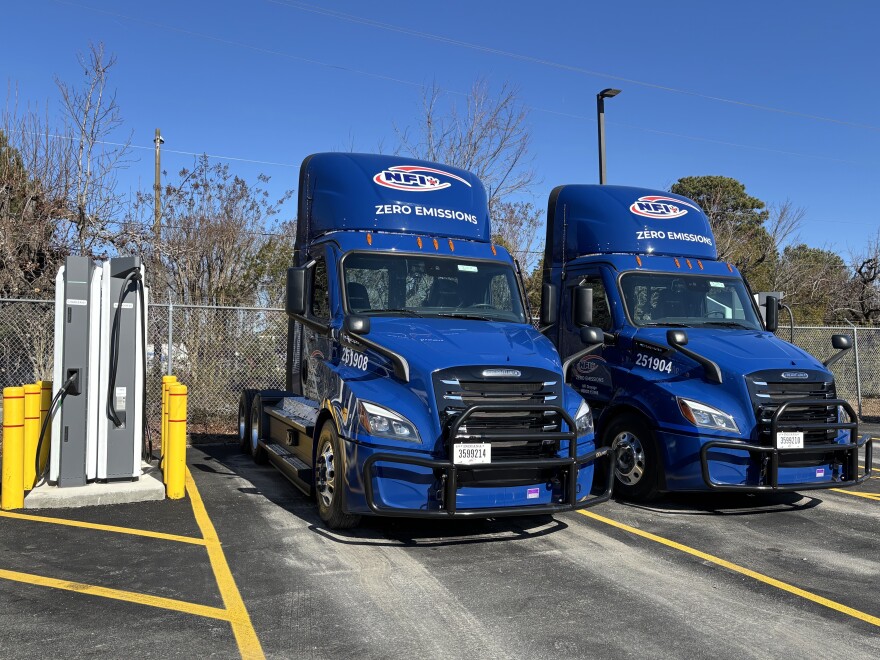 Two of NFI's new electric trucks at a warehouse in Chesapeake on Thursday, Jan. 22, 2026.