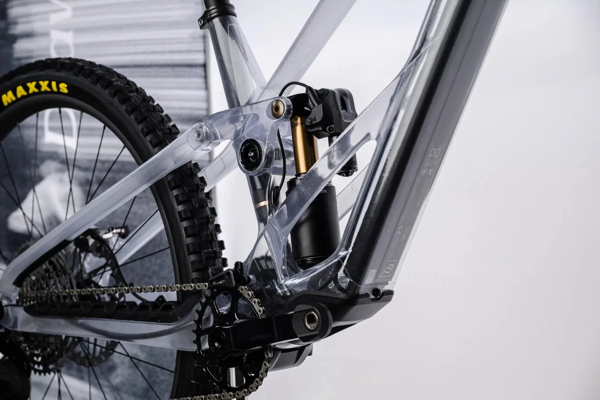 Transparent Orbea Rallon RS frame showing Fox X2 Live Valve NEO shock integration.