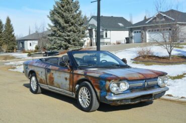Chrysler Sebring convertible with a Corvair body.