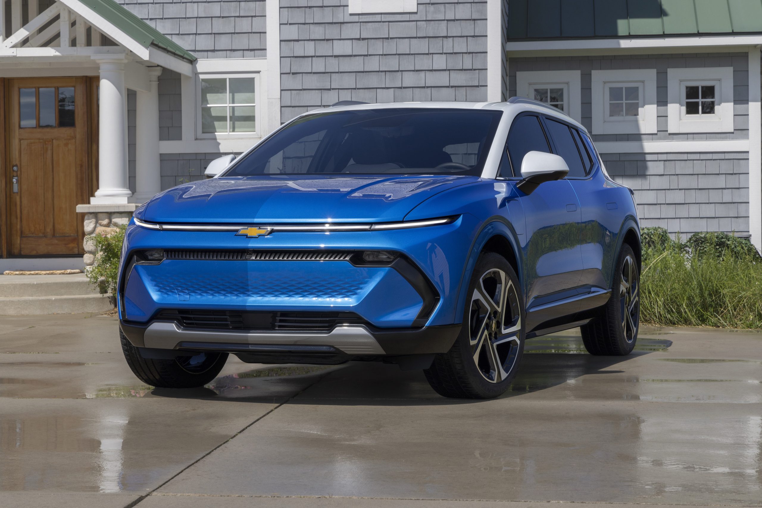 2025 Chevrolet Equinox EV 3LT parked in front of a home