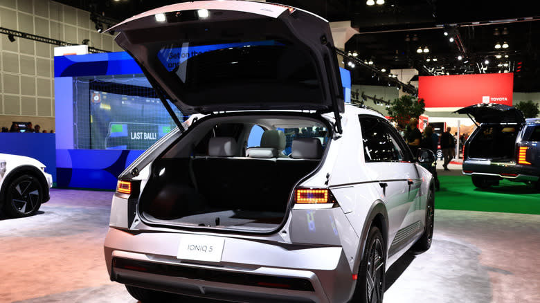 A Hyundai Ioniq 5 with trunk open at car show
