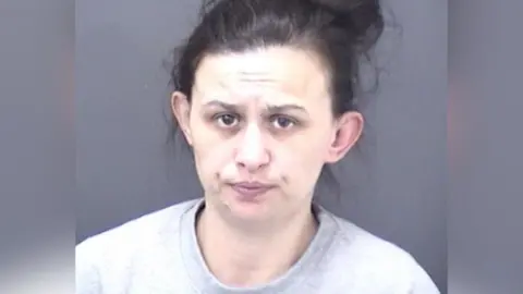 Dorset Police Custody picture of Zoe Treadwell wearing a light grey sweat top