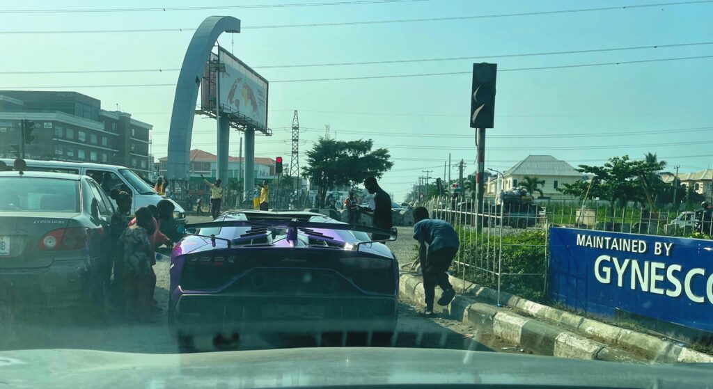 Spotted this bright purple beauty this morning at a red light. Barely had time to grab my phone when the police waved him through the red light (crazy!). Brilliant way to start the new year [Lamborghini Aventador SVJ]