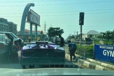 Spotted this bright purple beauty this morning at a red light. Barely had time to grab my phone when the police waved him through the red light (crazy!). Brilliant way to start the new year [Lamborghini Aventador SVJ]