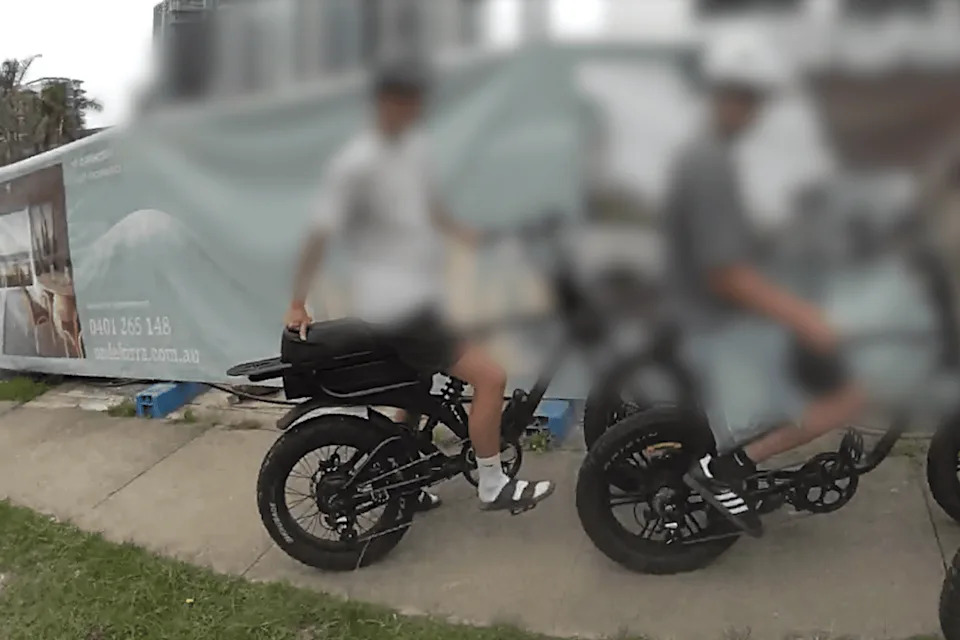 Youths on e-bikes in Queensland. 