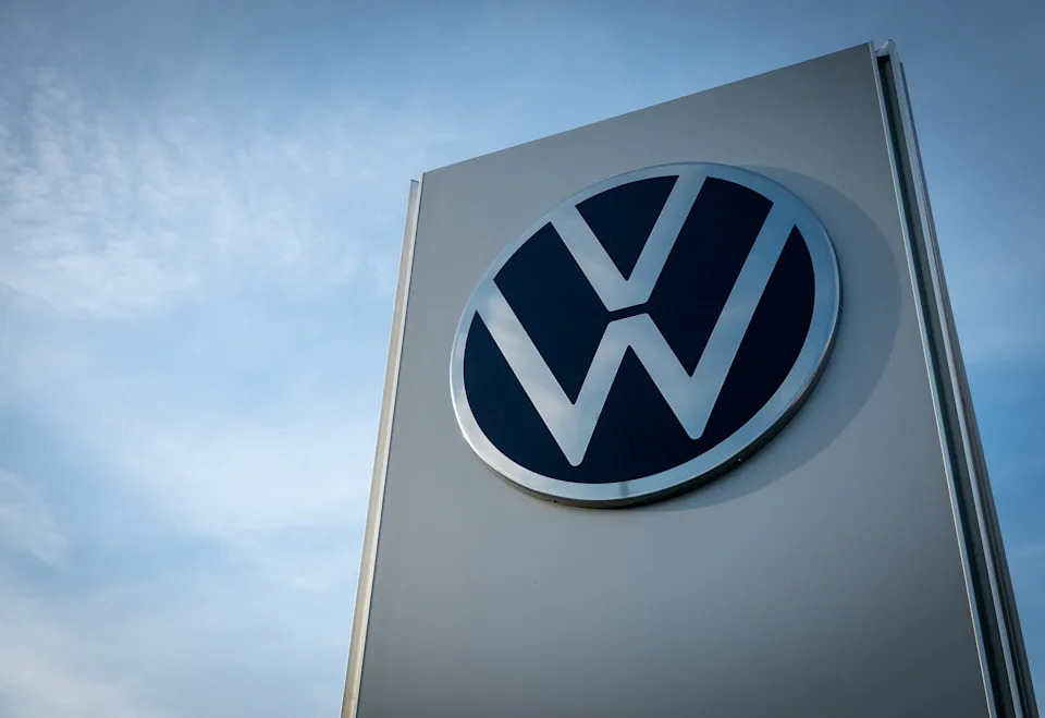SWINDON, UNITED KINGDOM - OCTOBER 23: The logo of car maker Volkswagen is displayed outside a Volkswagen dealership on October 23, 2025 in Swindon, England. Founded in 1937, the company best known for the iconic Volkswagen Beetle, was the largest automotive manufacturer by worldwide sales in 2016 and 2017 with the majority of its sales to the Chinese market. (Photo by Anna Barclay/Getty Images)