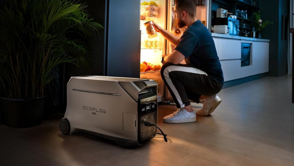 man powering refrigerator with EcoFlow DELTA Pro 3 power station