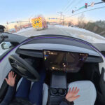 Tesla FSD v14 hears an ambulance, gives it way before the human could listen to the siren (video screenshot).