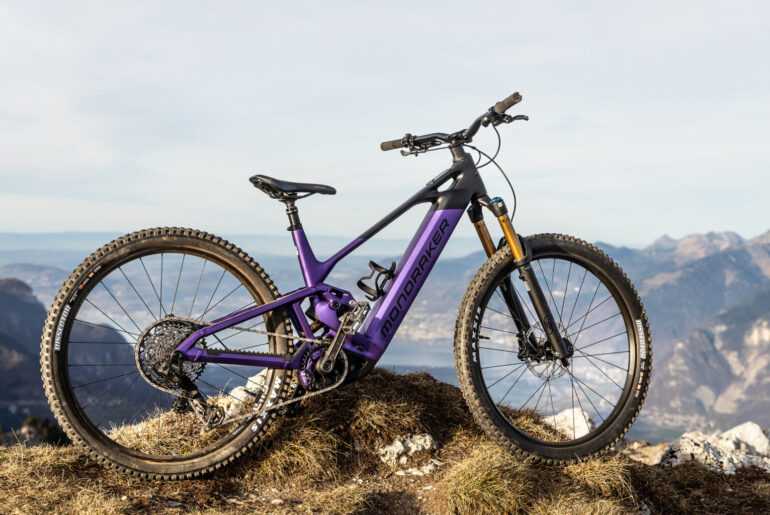 The new Mondraker Scree RR with a scenic mountain backdrop