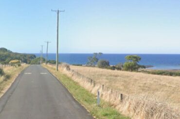 Teen boy killed riding e-bike into wooden pole in New Year’s Eve crash on coastal Tasmanian roadside
