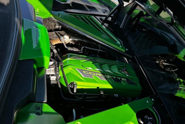The owner painted the engine bay green. He picked green screws and even has green glow in the dark valve stem covers. He loves green