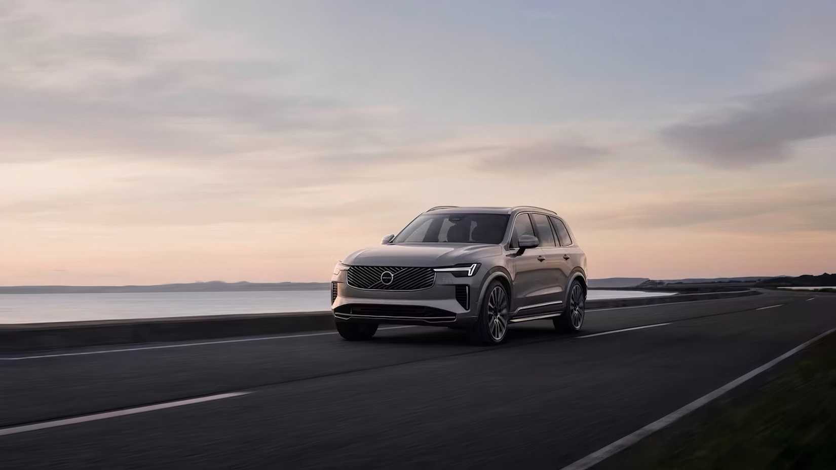 2025 Volvo XC90 in gray driving on coast road