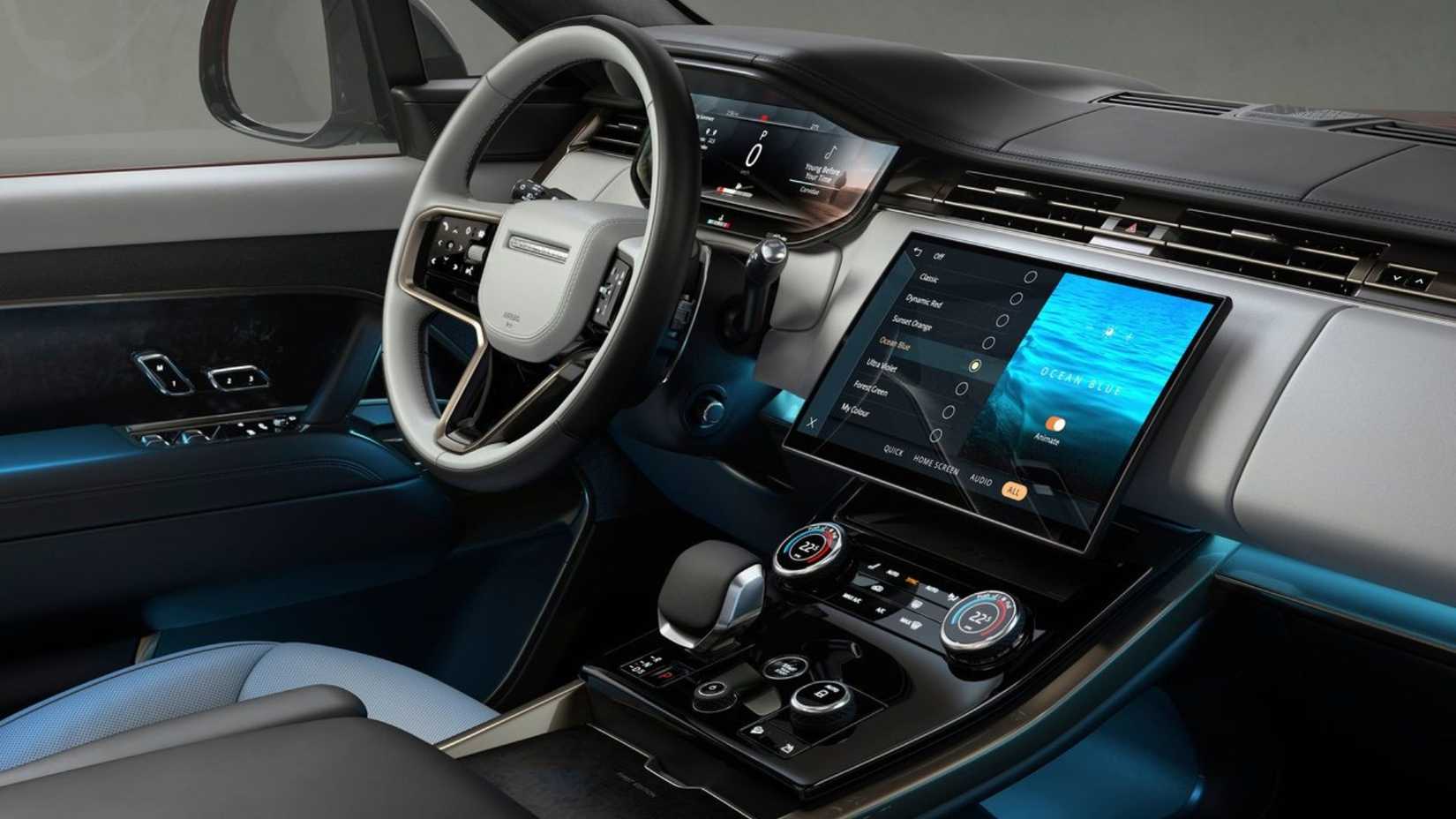 Shot of the steering wheel and dashboard inside the cabin of a 2023 Land Rover Range Rover Sport.