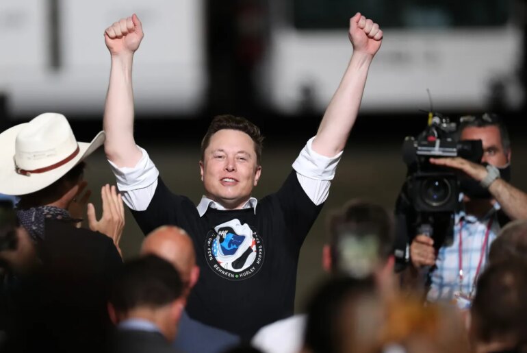 Elon Musk celebrates after the successful launch of the SpaceX Falcon 9 rocket at the Kennedy Space Center on May 30, 2020 in Cape Canaveral, Florida. (Photo by Joe Raedle/Getty Images)