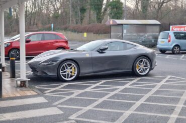 [Ferrari Roma] in a Sainsbury's parking lot.