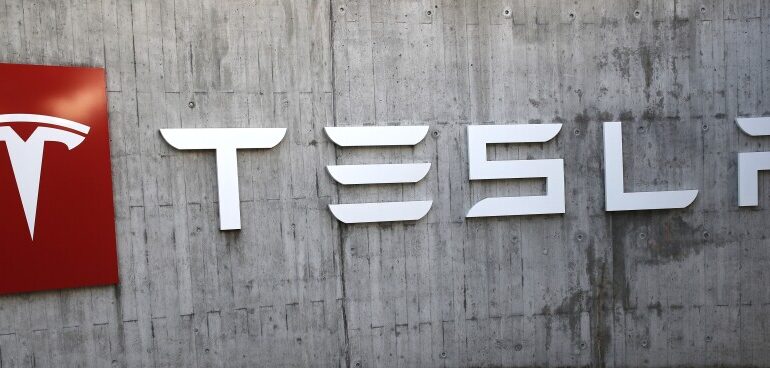 Tesla Wins $100 Million Cut in Legal Fees in Board Pay Pact