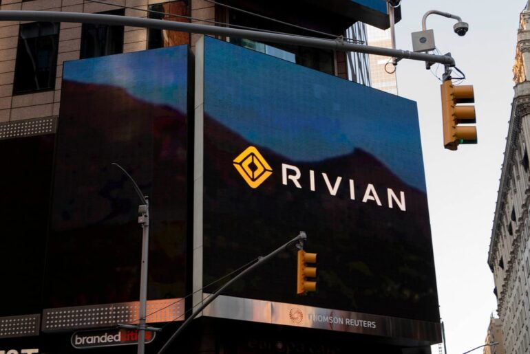 Rivian's logo on a billboard.