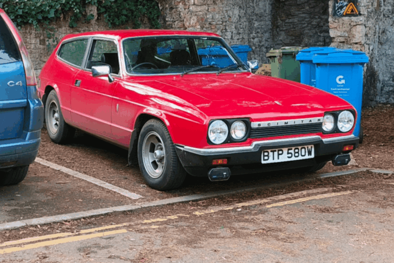 A [Reliant Scimitar] spotted in UK. Princess Anne had one of these.