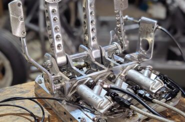 Project Mosquito needed a sliding, bias adjustable, floor hinge pedal box so we made this