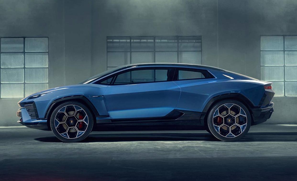 The side profile of a blue Lamborghini Lanzador. It's a two-door, coupe-like car with large rims and several muscular body lines.