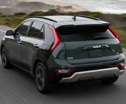 2025 Kia Niro Green Rear Angle Driving