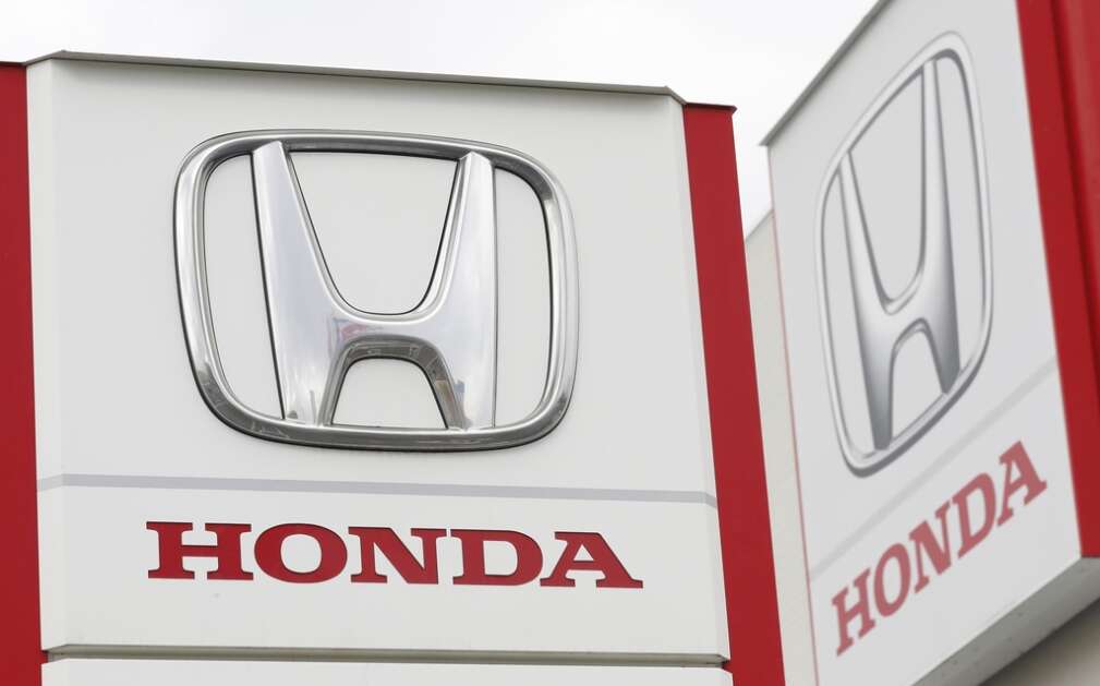 Logos of Honda Motor Co. are pictured in Tsukuba, northeast of Tokyo, Feb. 13, 2019. (Kyodo News via AP)