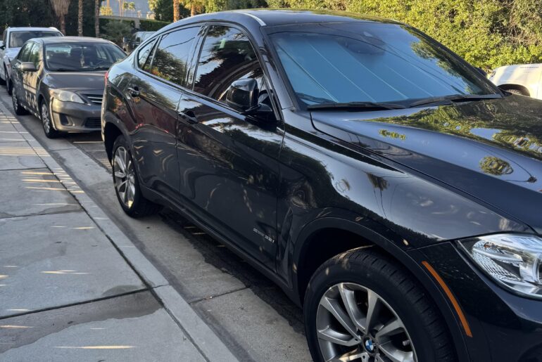 BMW X6 SDrive with an incorrectly installed staggered rim set, the official car of…