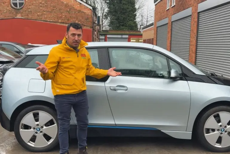 Discover how a technician saved a nearly scrap BMW electric car for $1,345 and performed a battery upgrade to double the driving range of the electric car