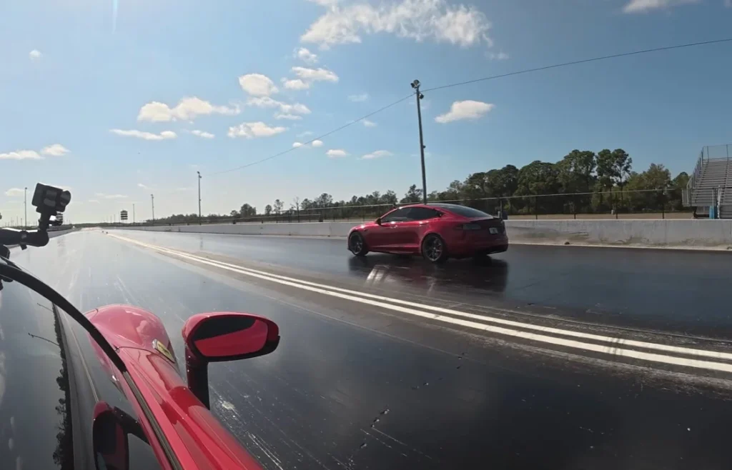 A Florida drag race between a Tesla Model S Plaid and a 1,200 hp Ferrari SF90 results in a new personal best time for the electric sedan at Bradenton