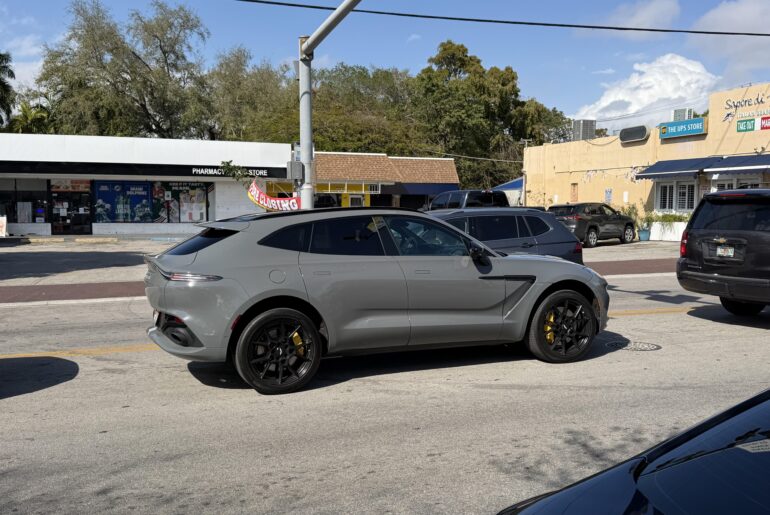 [Aston Martin DBX] in school pickup duty