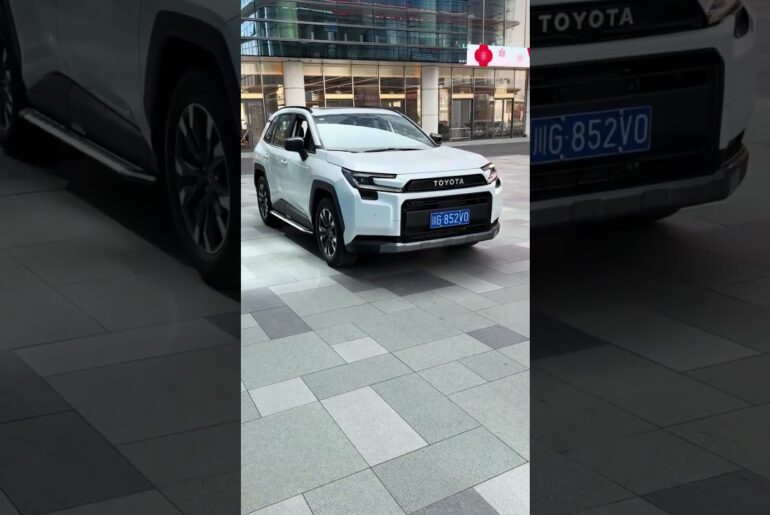 2026 RAV4 Woodland 2.0 (White) - Hybrid Power, Rugged Design.