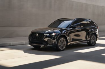 The Mazda CX-70 in black seen from a front quarter angle