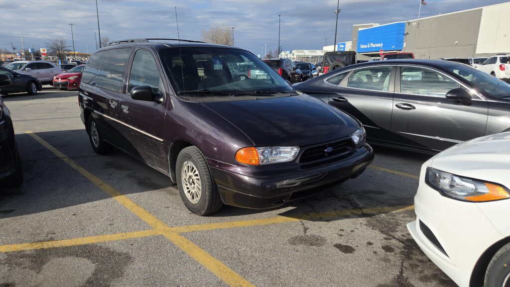 A very clean Ford Windstar casually sitting at my local Walmart