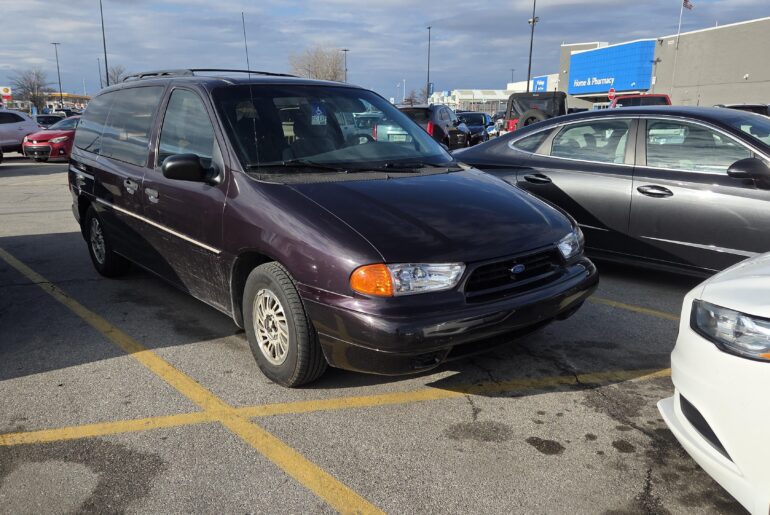 A very clean Ford Windstar casually sitting at my local Walmart